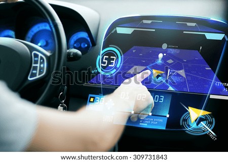 transport, destination, modern technology and people concept - male hand searching for route using navigation system on car dashboard screen Royalty-Free Stock Photo #309731843