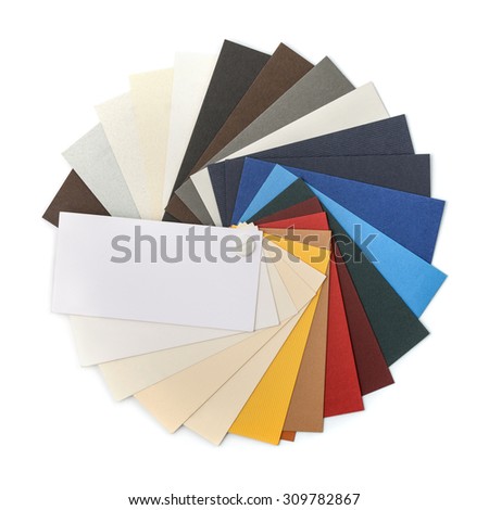 Fan of cardstock paper samples isolated on white