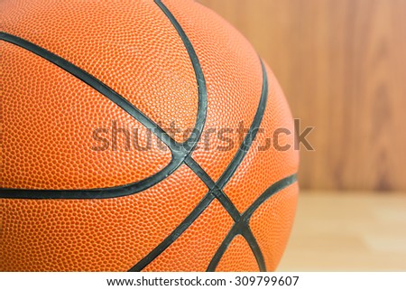 Macro ball Basketball on wooden floor background and copy space