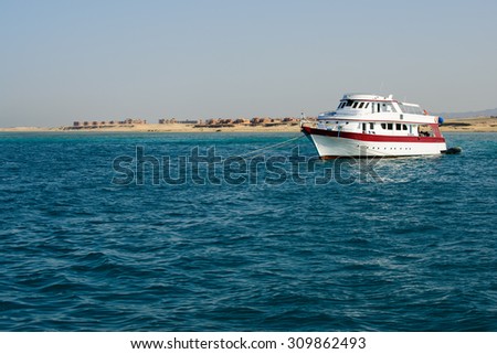 In the picture a yacht anchored near the port of Hamata , Egypt Red Sea