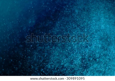 peacock color Background formed by water droplets, a beautiful pattern. Royalty-Free Stock Photo #309891095