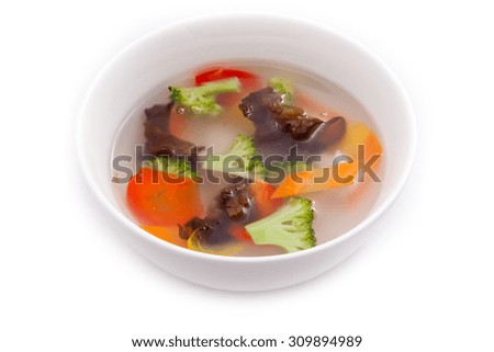 white porcelain bowl with shiitake vegetable soup