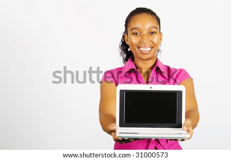 young african american businesswoman presenting a laptop