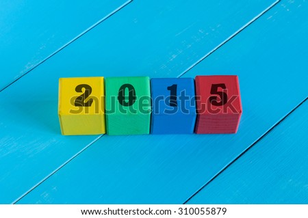Numeral 2015 on children's colourful cubes or blocks