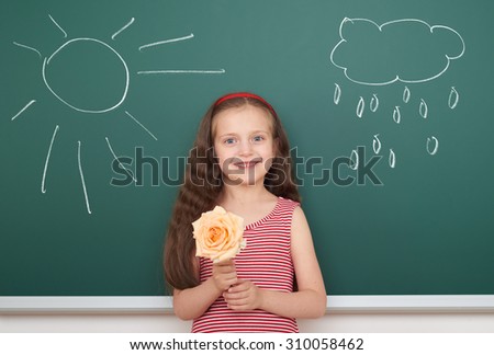 girl with flower draw sun and rainy cloud on board