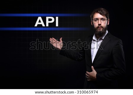Businessman over black background presenting API