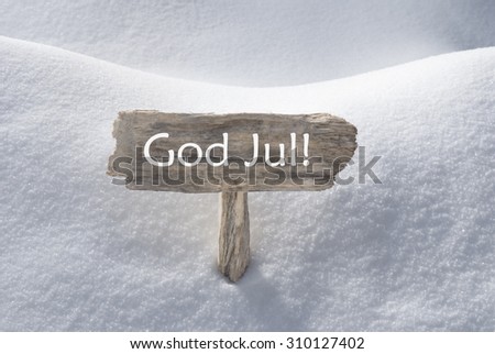 Wooden Christmas Sign With Snow In Snowy Scenery. Swedish Text God Jul Means Merry Christmas For Seasons Greetings Or Christmas Greetings. Christmas Atmosphere.
