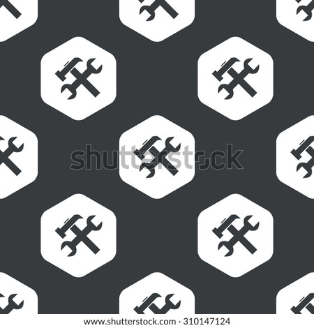 Image of wrench and hammer in hexagon, repeated on black