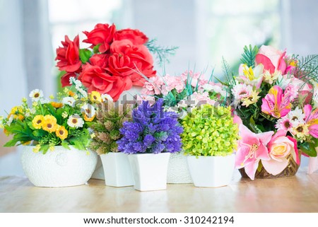 Colorful decoration artificial flower Royalty-Free Stock Photo #310242194