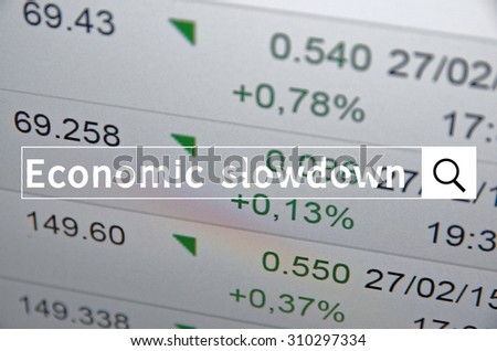 Economy slowdown written in search bar with the financial data visible in the background. Multiple exposure photo.