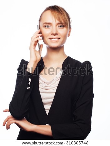 Business, people and office concept: young business woman with mobile phone. Positive emotion.Isolated on white.