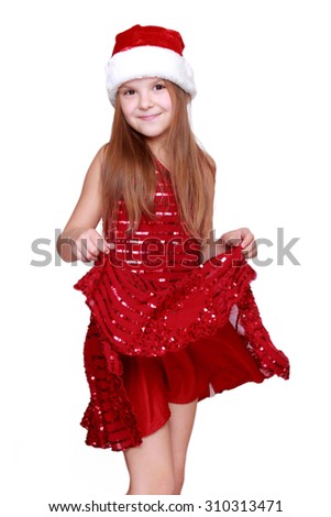 Pretty caucasian little girl dancing on Holiday theme/Beautiful little girl on Christmas