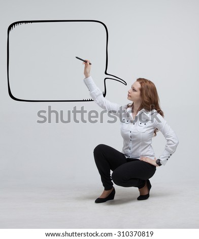 woman writes in a painted speech bubble