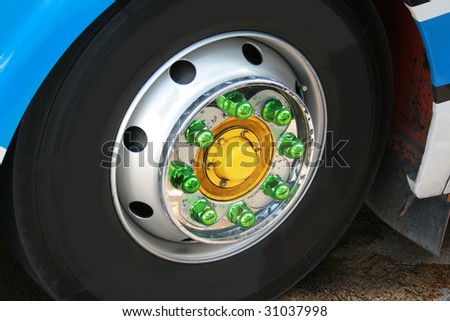 Bus wheel with colour nut on disk