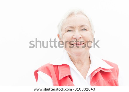 Smililing senior woman with grey hair