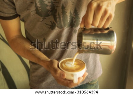 Making coffee latte art , blur picture style