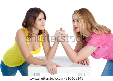 beautiful girls arm wrestling closeup