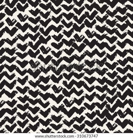 Vector seamless pattern. Abstract background with brush strokes. Monochrome hand drawn texture with chevron. Hipster trendy design.