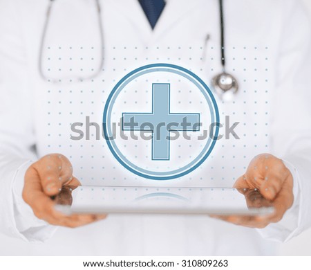 medicine, healthcare, pharmacy and hospital concept - male doctor with stethoscope holding tablet pc with pharmacy sign