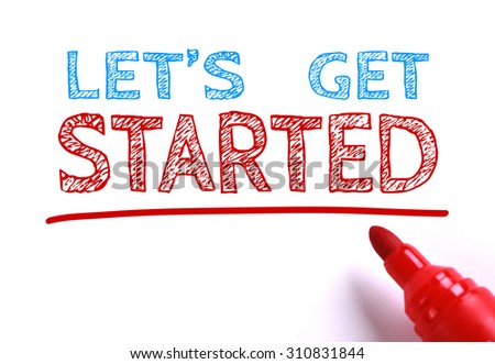 Text Let us get started with red marker aside is isolated on white paper background. Royalty-Free Stock Photo #310831844