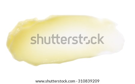 Yellow color skincare balm on background Royalty-Free Stock Photo #310839209
