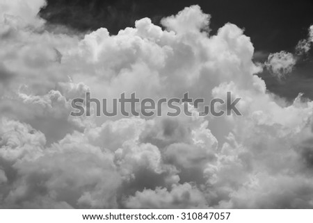 Bright sky with fluffy white clouds 