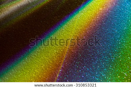 image of lines like the rainbow colors over a glittered surface ideal for theme of mobile screen or background to write quote in cards on slides and presentations with many color