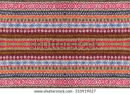 Ornamented knitted wool texture Royalty-Free Stock Photo #310919027