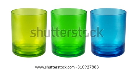 Plastic glass of various color isolated on white Royalty-Free Stock Photo #310927883