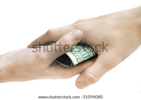 A handshake filled with cash