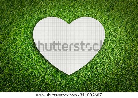  paper on green grass background