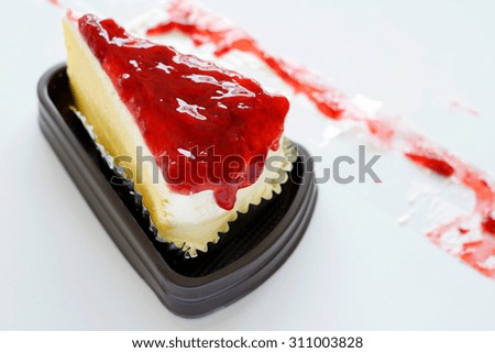Strawberry cake in plastic tray 