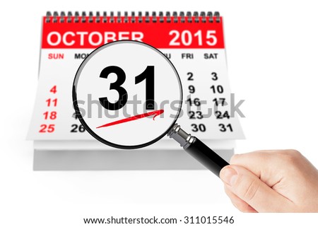 All Saints Day Concept. 31 October 2015 calendar with magnifier on a white background