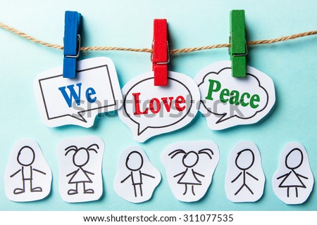 We love peace paper speech bubbles and some paper person under them.