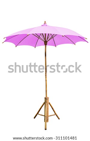Pink beach umbrella with stand isolated on white, work with clipping path.
