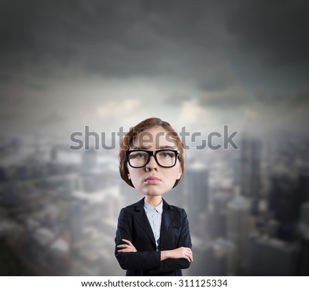 Funny young businesswoman with big head wearing glasses 