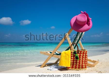 Picture of Beach lounger on the tropical beach, vacation. Traveler dreams concept
