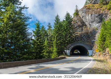 Road Tunnel - Mountain Tunnel in Olympic national park,Washington State.Usa Royalty-Free Stock Photo #311206469