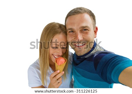 Cheerful couple taking selfie