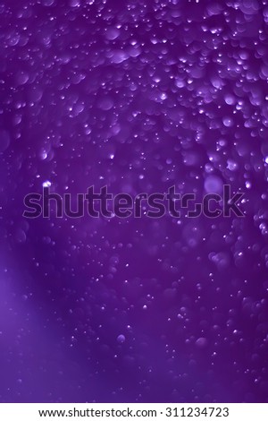 vertical purple color Background formed by water droplets, a beautiful pattern.
