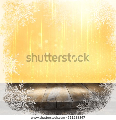 rustic wood table in front of glitter gold, silver and white bright bokeh lights
