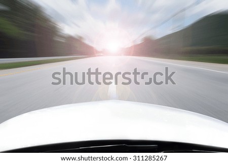 car running with speed on the street