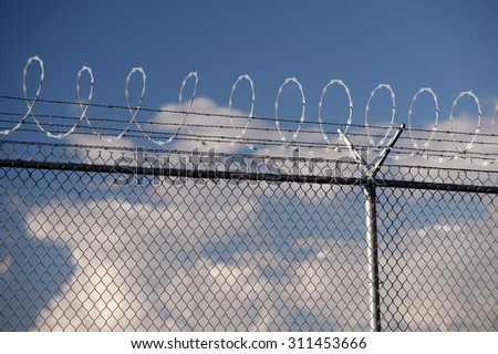 Barbwire boundary, fence