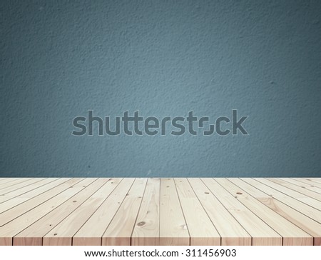 Wooden table on grunge background