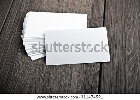Business cards on wooden table