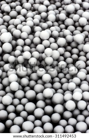 Silhouette of foam balls on the light.Create for background texture.Used invert tool for create picture style.