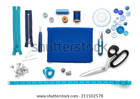 Overhead view of sewing tools and accessories Royalty-Free Stock Photo #311502578