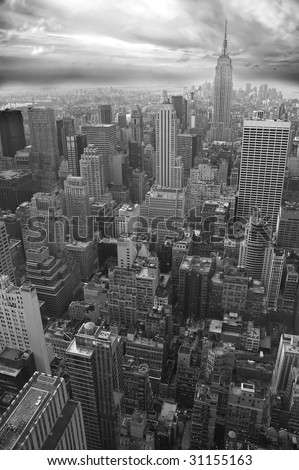 New York black and white vertical photo, Empire State Building visible in distance