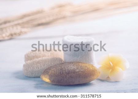 Spa aromatherapy products on wooden background,retro effect