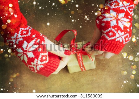Woman wrapping christmas gift